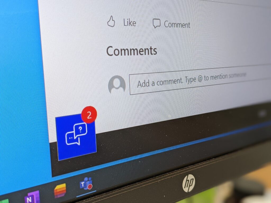 Computer screen displaying a chatbot and comments